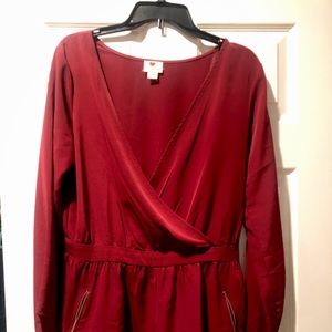 Burgundy long sleeve, short romper with pockets and side zipper. Size m